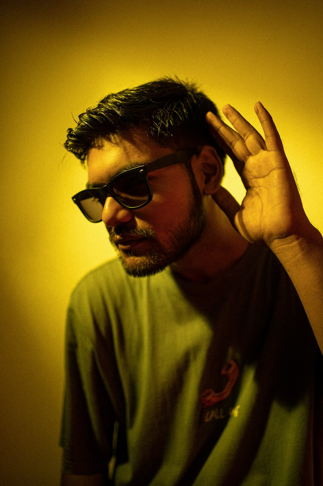 Studio portrait of a man with glasses and short beard