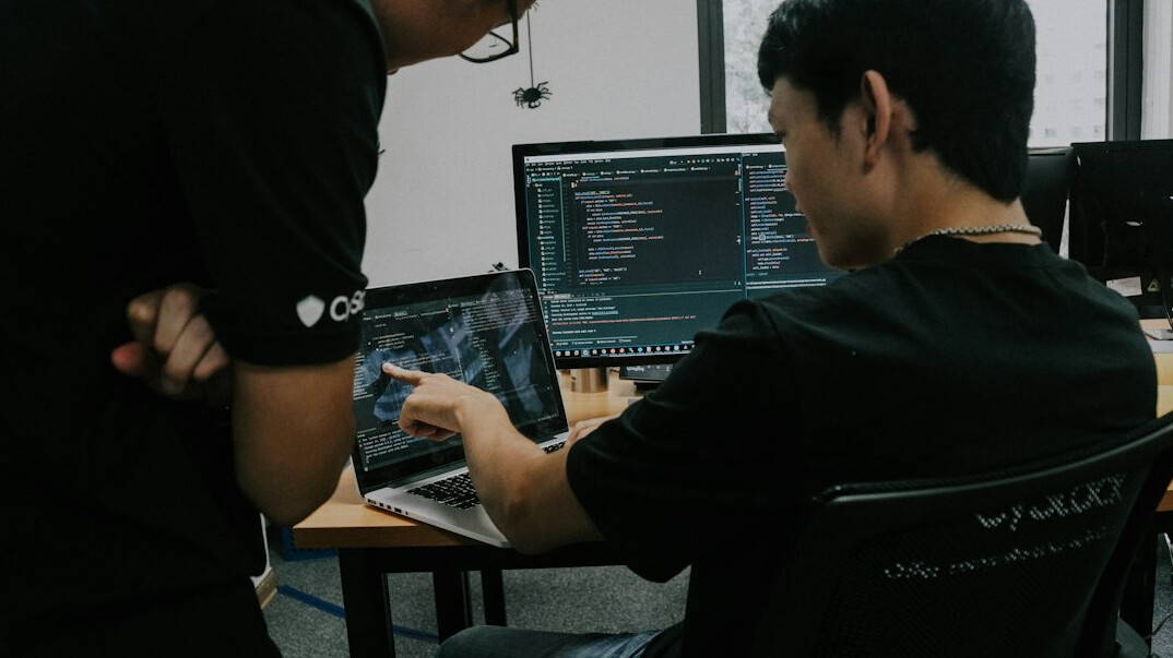 programmers working on code